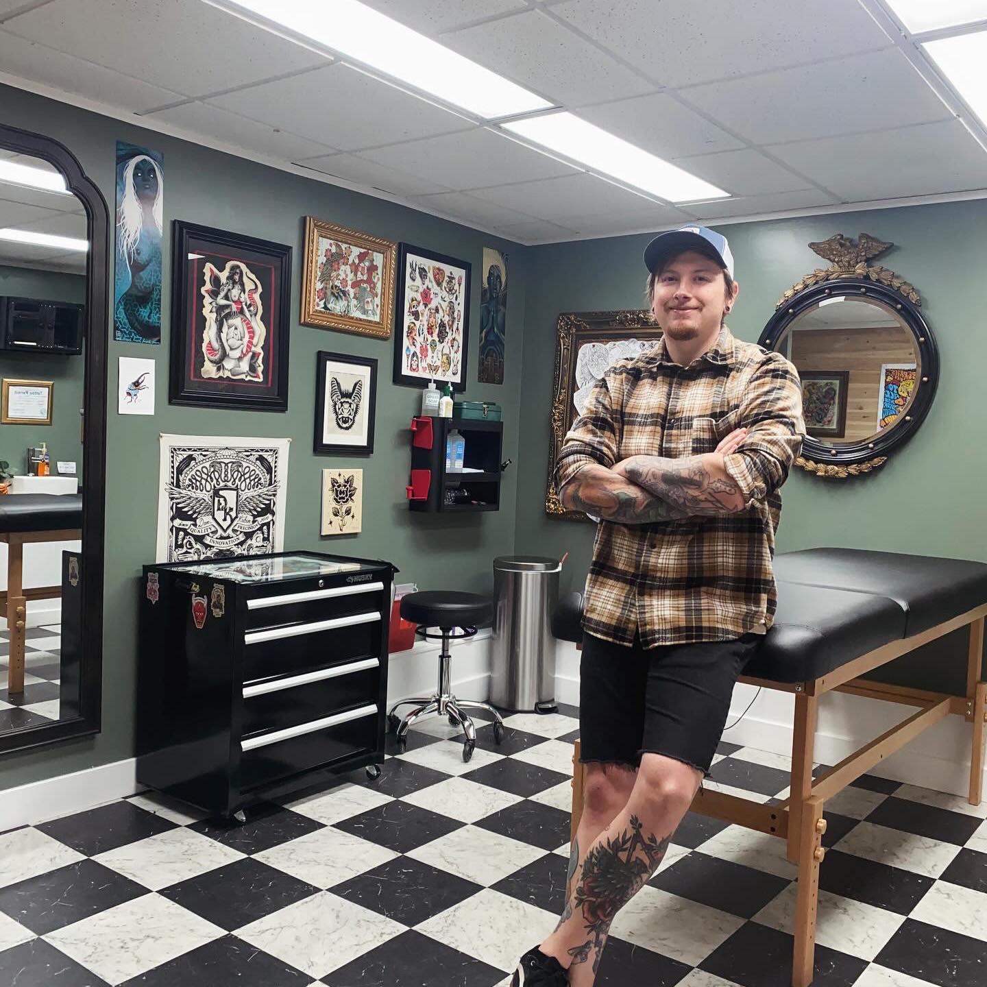 Nathan King in his tattoo shop